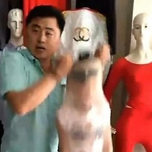 Chinese man gives hillarious demonstration of pantyhose tights by stuffing his son in it