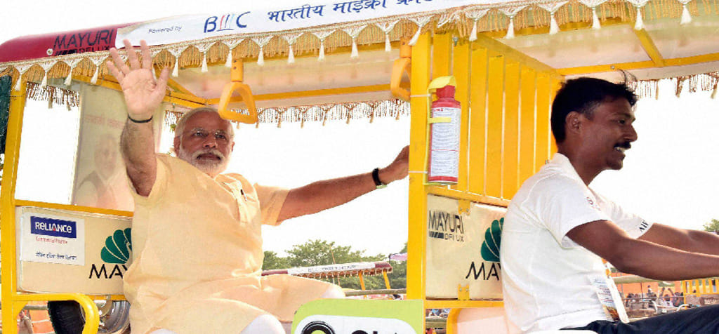 http://spiderimg.amarujala.com/assets/images/uploads/riksha-modi_572615f9d818b.jpg