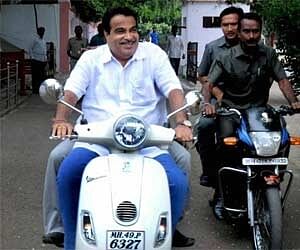 Image result for nitin gadkari without helmet
