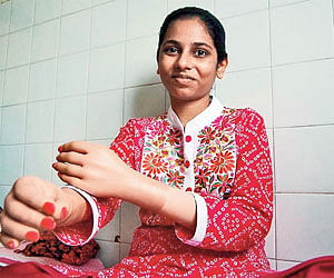 Girl who lost both arms in rail accident gets 63 per cent in HSC exam