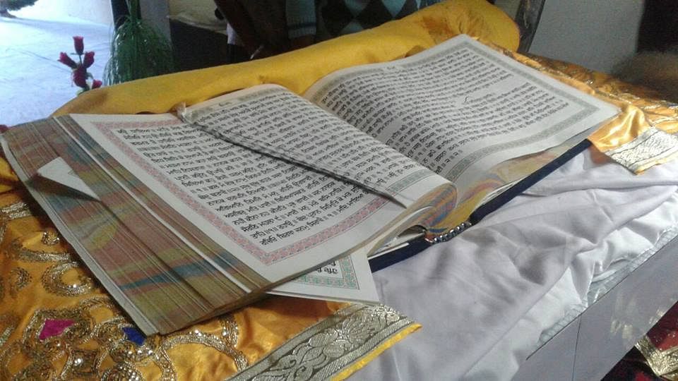 Coarseness Of Sri Guru Granth Sahib In Derabassi, Punjab News - डेराबस्सी:  गुरु ग्रंथ साहिब की बेअदबी से तनाव, 5 घंटे में आरोपी गिरफ्तार - Amar Ujala  Hindi News Live