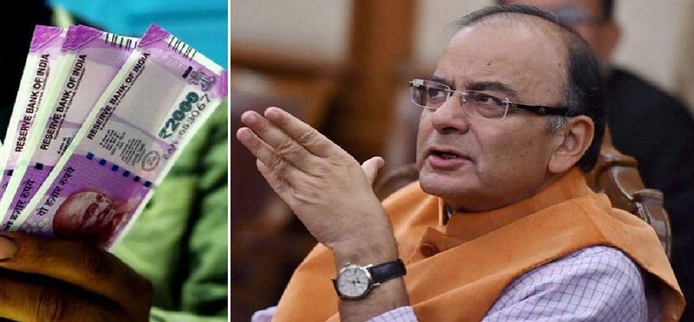 Image result for arun jaitley holding 2000 note