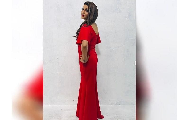 Sapna Choudhary Photoshoot In Red Color Dress With Tatoo 