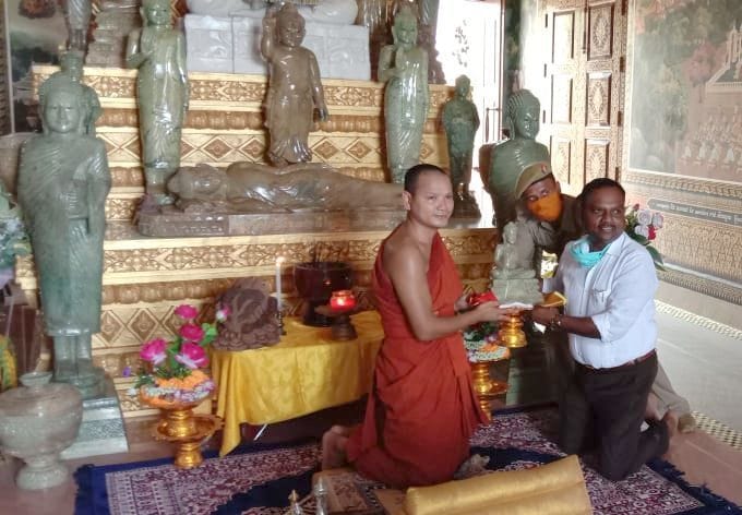 commissioner saw the buddha temple with family commissioner saw the buddha temple with family
