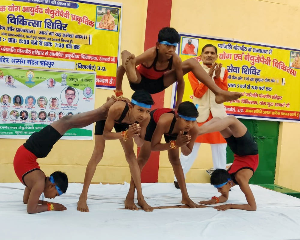 चांदपुर में रामलीला मैदान स्थित वेद मंदिर में आयोजित योग एवं प्राकृतिक चिकित्सा शिविर में योग क? चांदपुर में रामलीला मैदान स्थित वेद मंदिर में आयोजित योग एवं प्राकृतिक चिकित्सा शिविर में योग क?