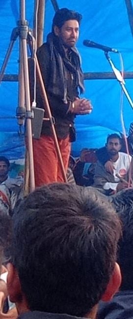 टीकरी बॉर्डर पर किसानों की सभा में अपने विचार व्यक्त करते हरभजन मान। संवाद टीकरी बॉर्डर पर किसानों की सभा में अपने विचार व्यक्त करते हरभजन मान। संवाद