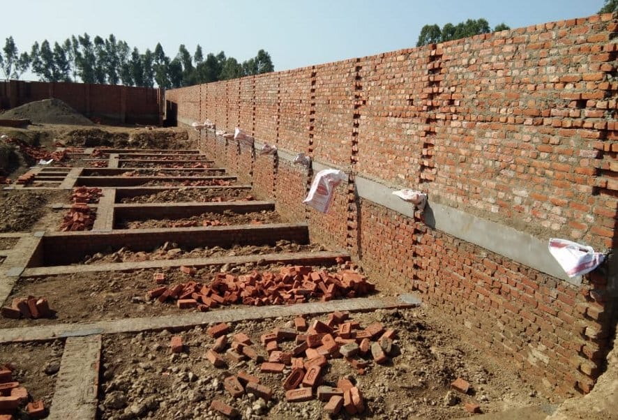 नजीबाबाद में निर्माणाधीन आवास एवं विकास परिषद के भवन।