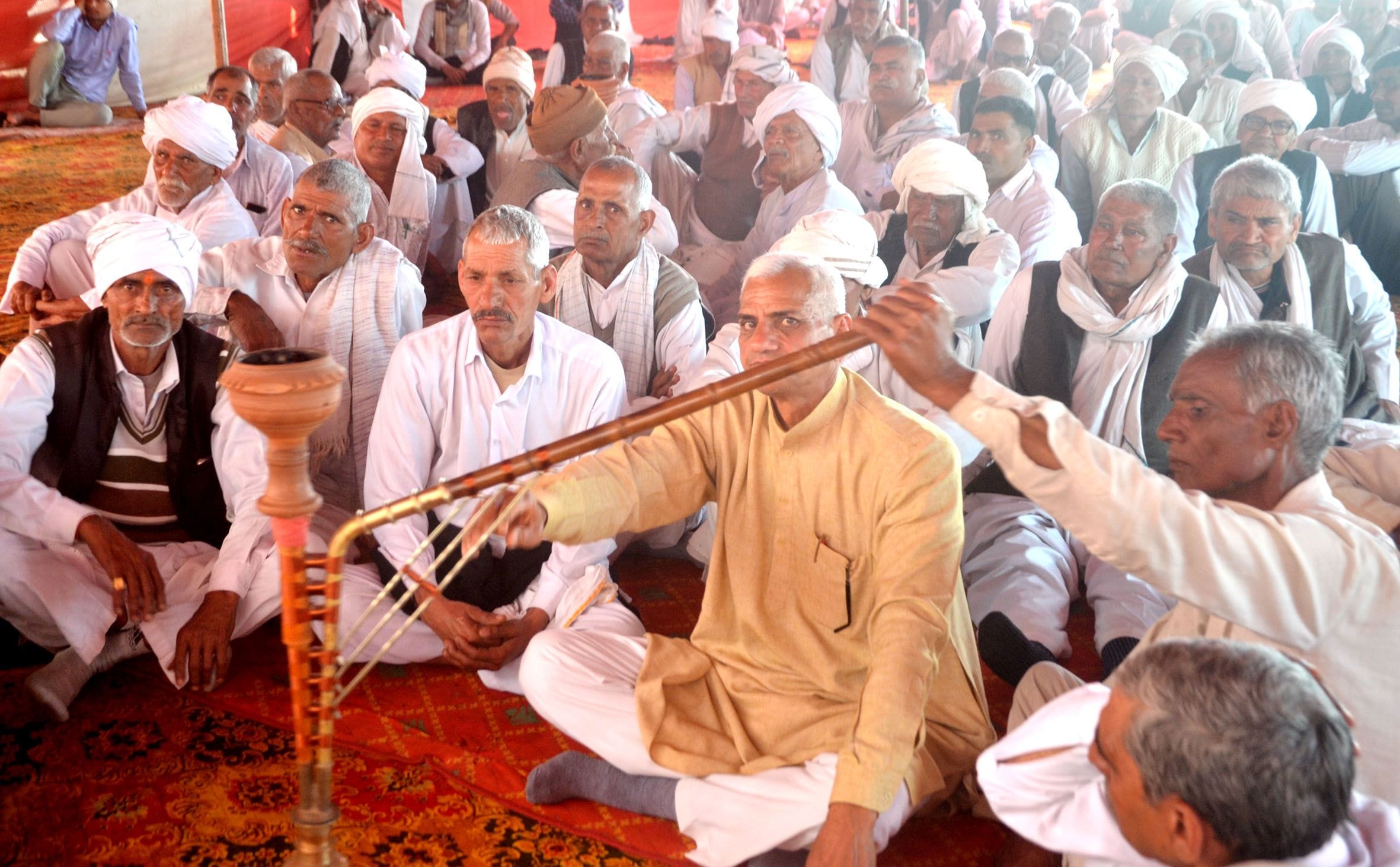 पलवल में धरना स्थल मौजूद किसान। पलवल में धरना स्थल मौजूद किसान।