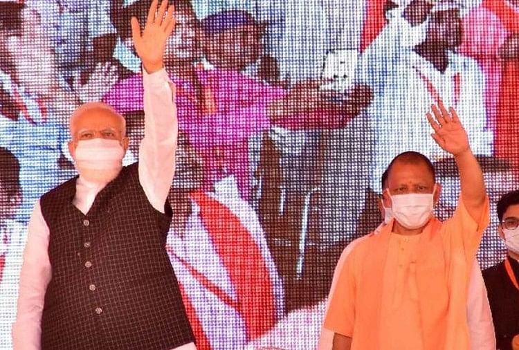 पीएम मोदी और सीएम योगी।