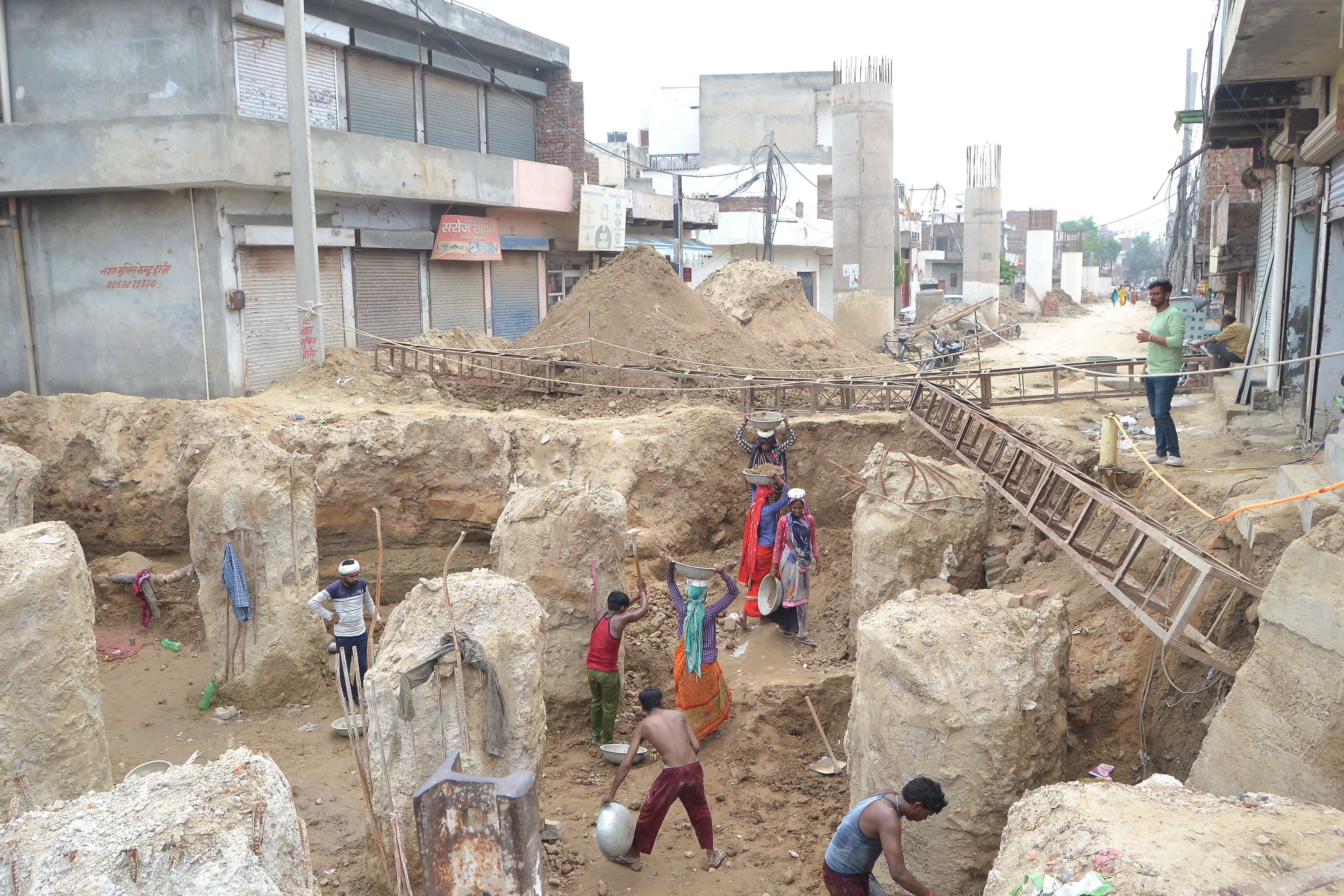 The workers were engaged in the construction of a bridge located at the gate of Jeetu Wala.  Dialogue
