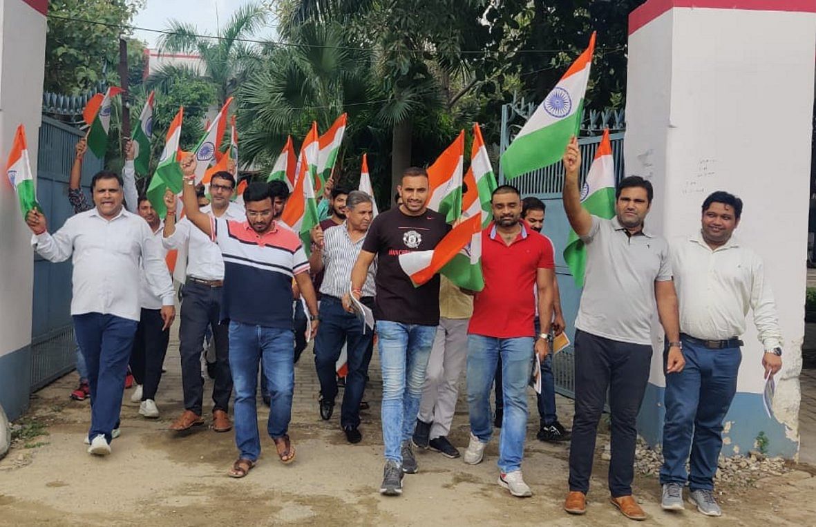 Students and students of Phulwati Institute of Law College taking out tricolor yatra at Agrawal Mandi Tatiri