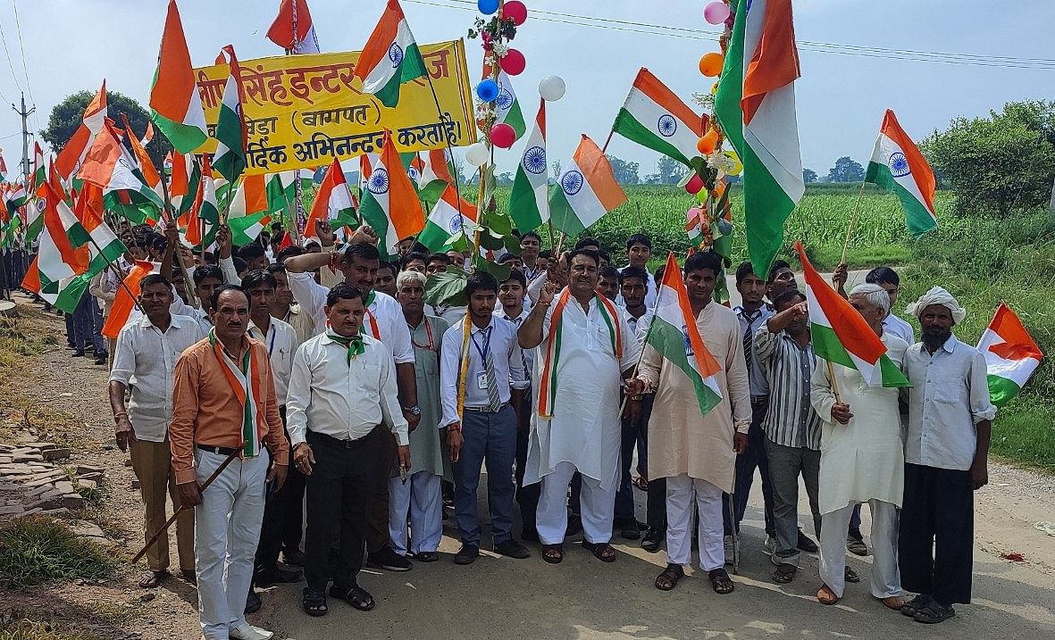 Students and staff of Dalip Singh College holding a tricolor rally in Gwalikheda