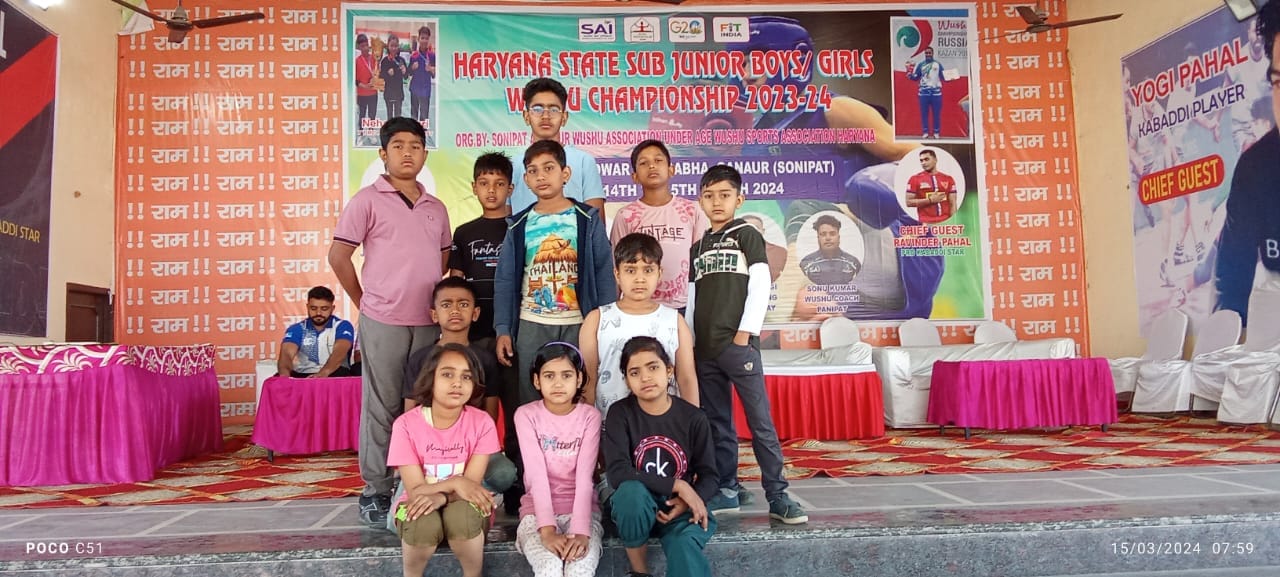 रेवाड़ी। राज्य स्तरीय वुशू प्रतियोगिता में पदक विजेता रेवाड़ी के खिलाड़ी। स्रोत: स्वयं