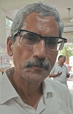 रवींद्र मलिक।