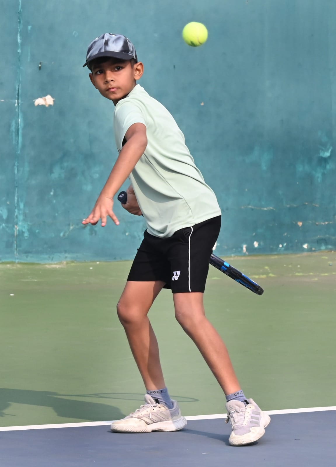 टूर्नामेंट में शॉट लगाते हमदान टूर्नामेंट में शॉट लगाते हमदान