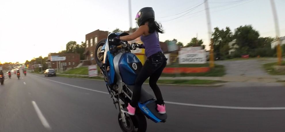 girl bike stunt