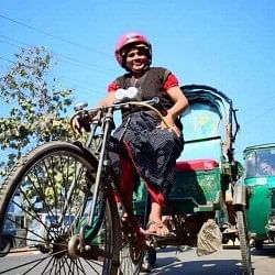 women single rickshaw puller from bangladeh