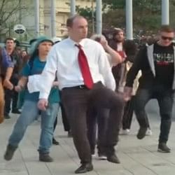 weird silly walk parade in Hungary Budapest where people walk strangely