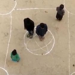 viral video of guys who playing carrom on ground using people