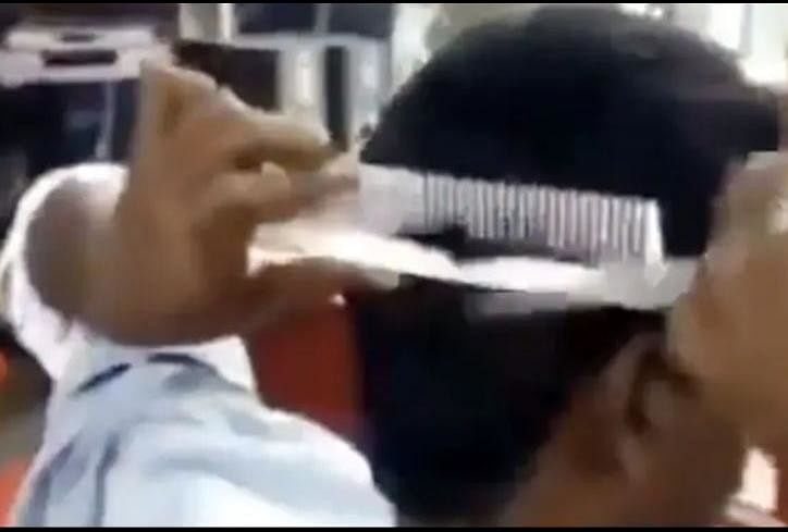 viral video of man who cut their hair by own ias give hilarious reaction on it