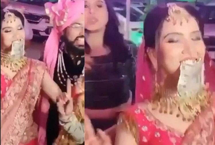 Bride dances by pressing 500 note in her mouth in Wedding video goes viral on social media
