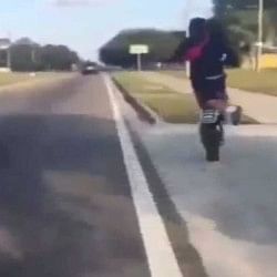 boy was doing stunt with full speed bike and collided with pole