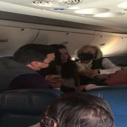 lady slapped an old man in the flight but she did not wear a mask video goes viral