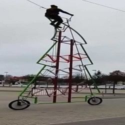 man designs tallest rideable bicycle that is over 24 feet long name in Guinness World Records