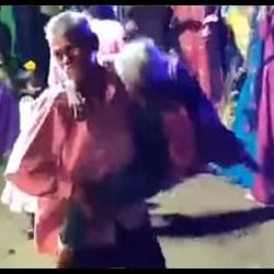 Funny Dance Video Grandfather did Gadar dance with Grandma in his lap video goes viral on internet