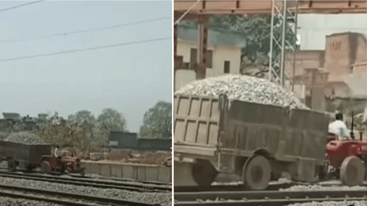 The indian man ran the tractor on the train track video is going viral on social media