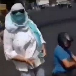 Woman fell from scooty on road put blame on biker But the viral video exposed