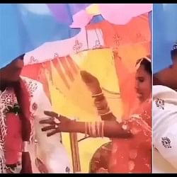 bride started beating the groom on stage, then both of them beat each other video viral