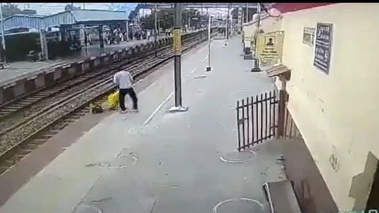 woman crossing railway line suddenly superfast train came on track Shikohabad video viral