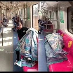 Boy lying down with a pillow-sheet in the metro, video went viral on social media