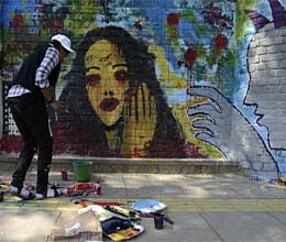 500 artists paint Delhi University wall