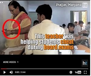  Caught on Camera: Teacher helping students in Haryana Board exam 